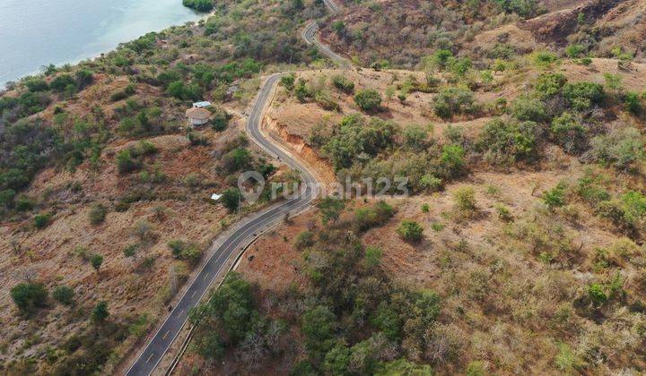 Tanah seluas 23.115 m2, Berada di pinggir jalan raya aspal hotmix, tepat dibukit dengan sunset dan ocean view terbaik 2