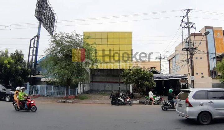 Kavling ada bangunan kios di jalan Jendral Sudirman 1