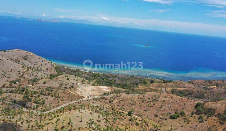 Tanah di bukit, pinggir jalan raya. sangat murah, dengan pemandangan laut dan matahari terbenam 2