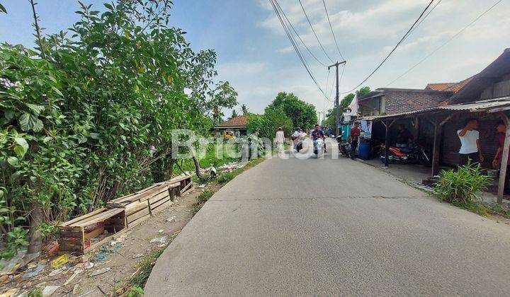 TANAH DIPINGGIR JALAN RAYA , 2