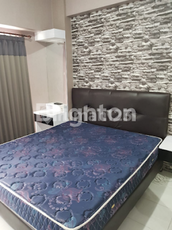 UC Citraland West Surabaya apartment. Near UC campus. Fully furnished. Ready to occupy. Nice. Golf view. Affordable.