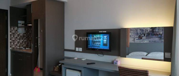 Apartemen Studio + Kitchen Full Furnished View Swimmingpool 1