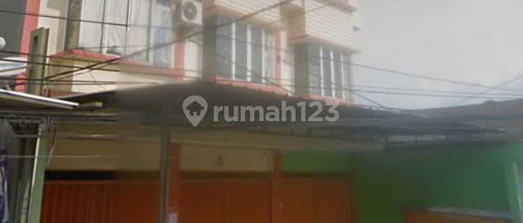 Two-story attached shophouse near Greenlake. 1