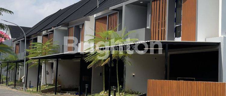 di  rumah baru modern tropis di belakang Hotel Aston basuki rahmat 1