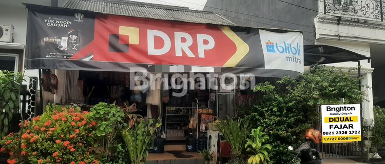 House and shop ready for use along with the contents inside the shop. 1