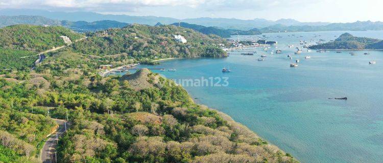 Tanah di bukit, pinggir jalan raya. sangat murah, dengan pemandangan laut dan matahari terbenam 1